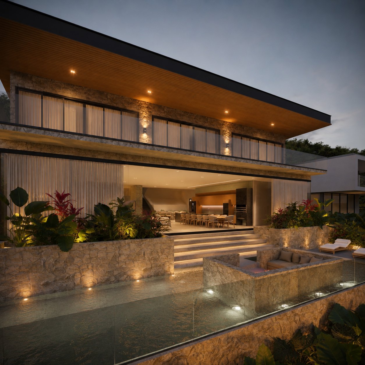 Terraço da residência com espelho d’água, escada iluminada e lounge rebaixado em pedra